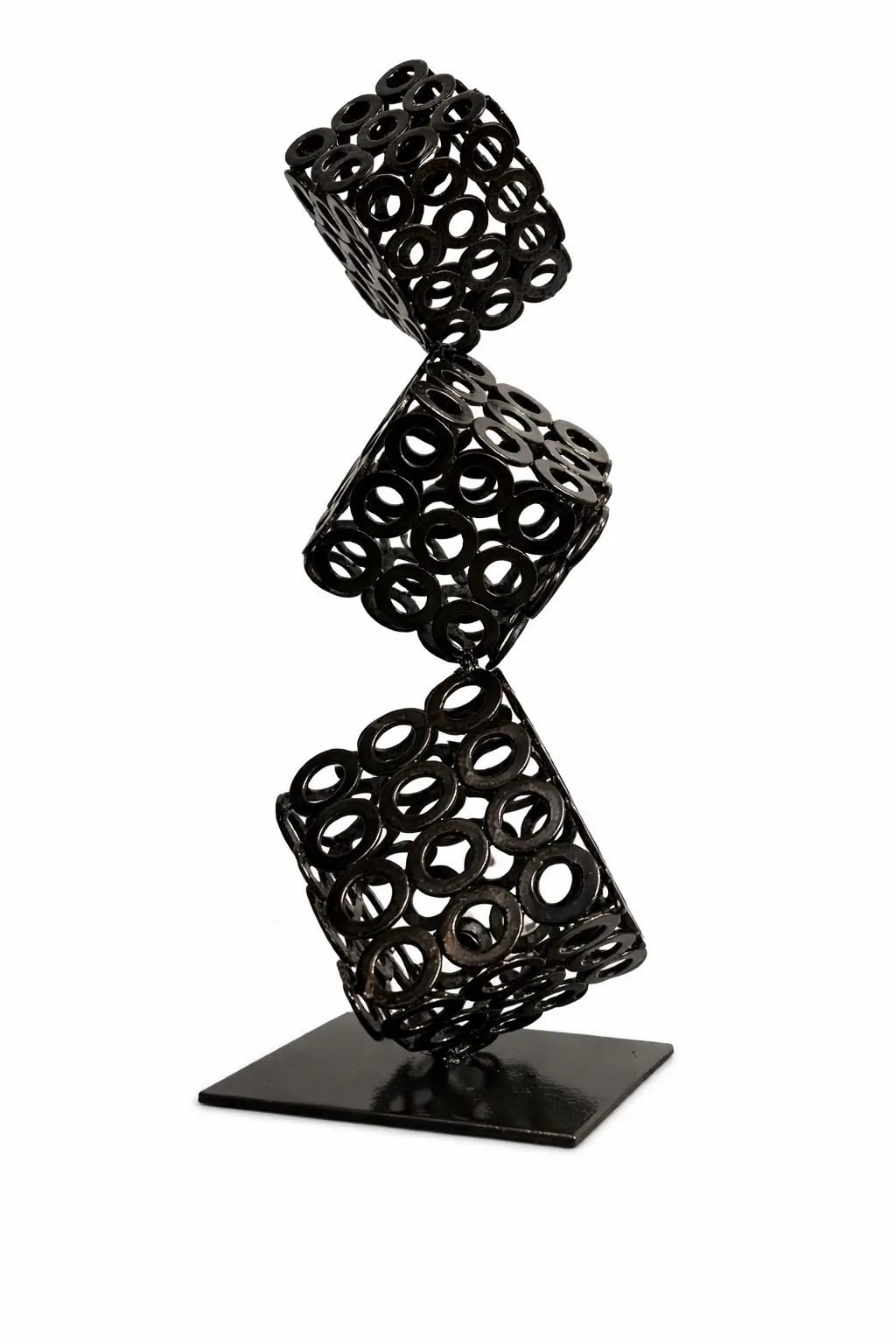 stacked metal cube sculpture made from welded steel plates