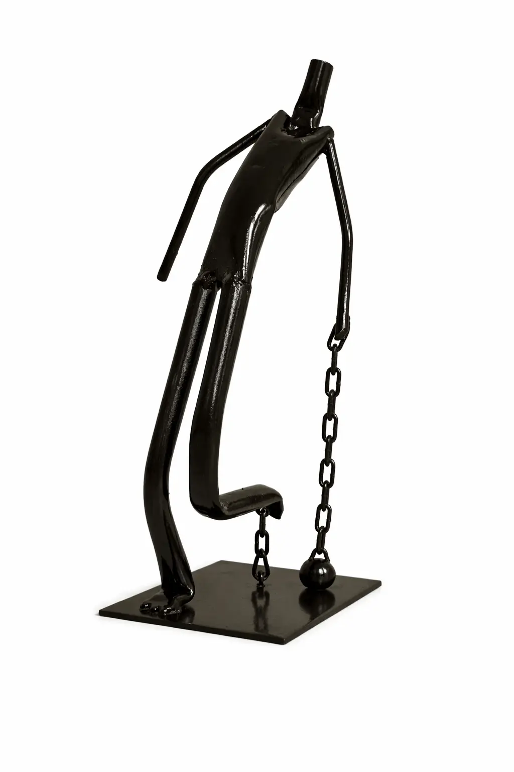 Iron sculpture of man in chains