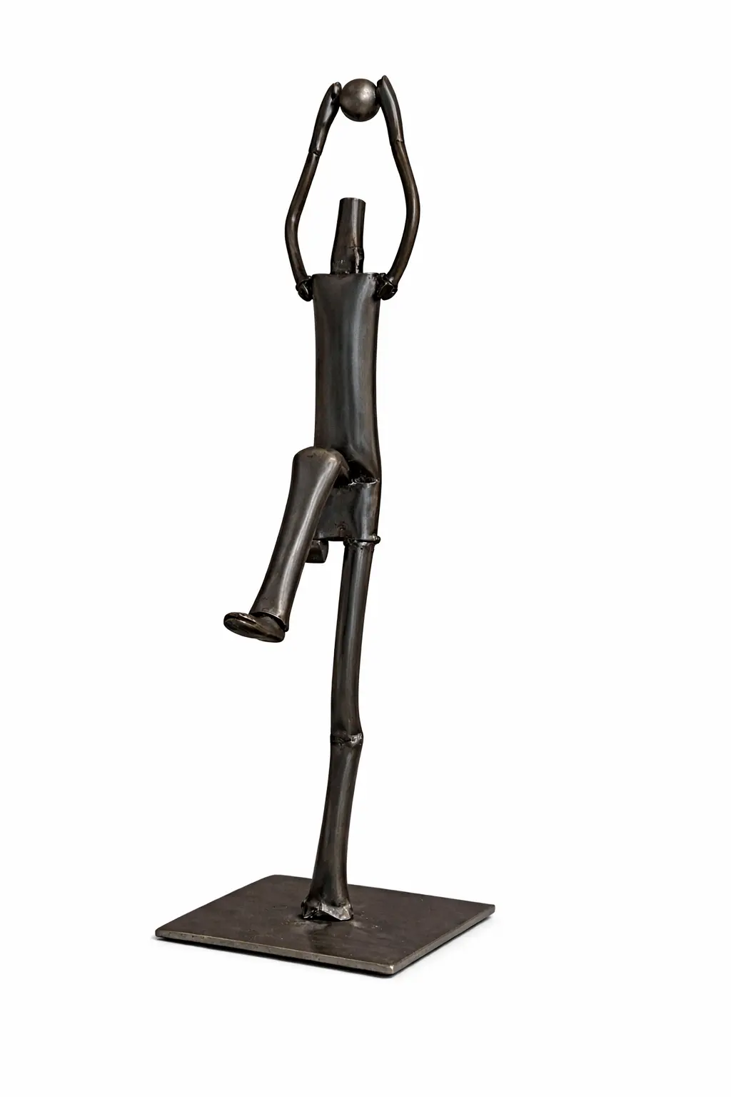 Metal sculpture of basketball player