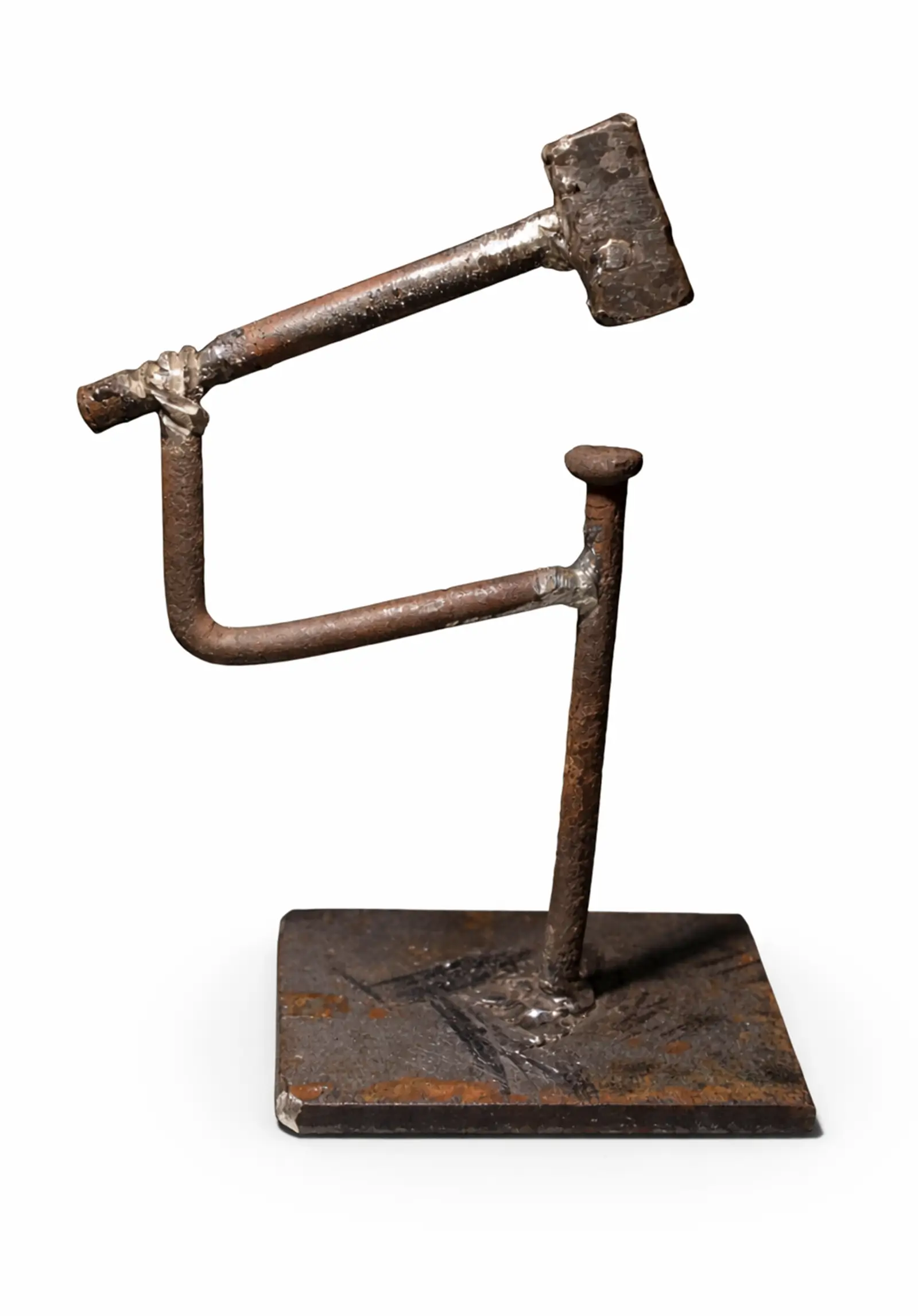 handmade metal nail figure holding hammer above its head